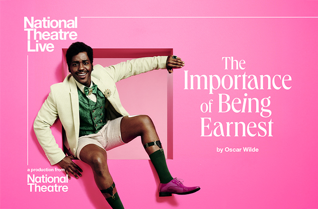 Poster image for The Importance of Being Earnest, featuring the title and Ncuti Gatwa sitting in a crevice, smiling and impeccably dressed in a beige jacket, green waistcoat and beige shorts.