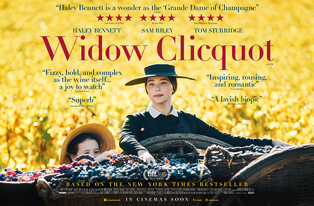 Poster for Widow Clicquot. A woman is pictured in a field, with a little girl at her side. There are sifting through a large stock of grapes in wicker baskets.